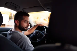 uber driver looking at passenger